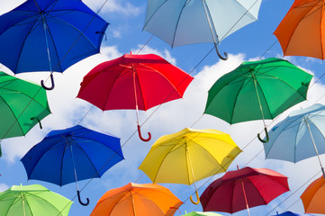 Fototapeta na wymiar blue, white, red, yellow umbrellas