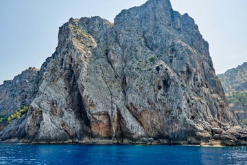Fototapeta na wymiar Spain. Mallorca. Rocky shores of the northern coast