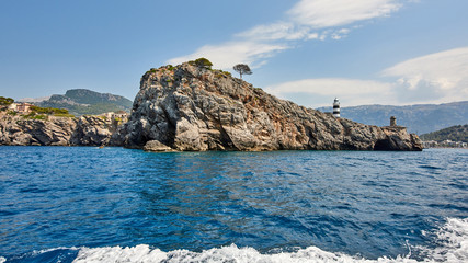 Spain. Mallorca. The boat approaches the port de Soller lighthouse