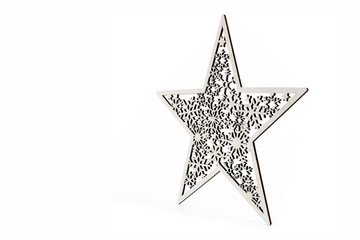 Obraz premium White star as Christmas decoration made and cut out with laser from wood