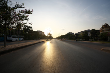 Fototapeta premium Siem Reap,Cambodia-Januay 9, 2019: Sunrise viewed from National Highway 6 in Siem Reap, Cambodia 