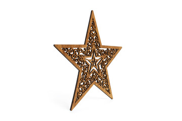 Obraz premium Brown star as Christmas decoration made and cut out with laser from wood