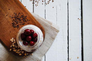 Oatmeal with berries in a jar