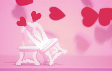 Heart on the chair. Concept of love and celebration, Valentine's Day, Mother's Day, International Women's Day. Abstract background, selective focus, place for tex