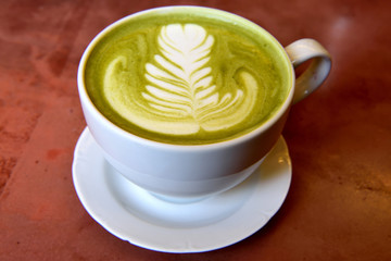 Cup of matcha latte.