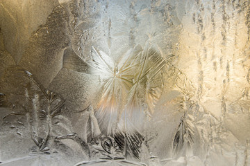Amazing Crisp Frost Draw Structure on a Window with Warm Yellow Gradient Light