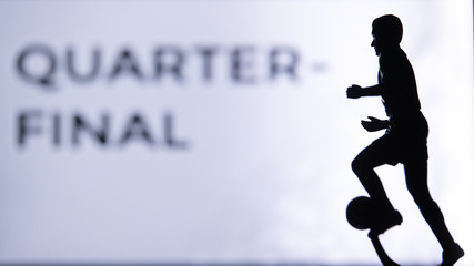 QUARTER-FINAL, QUARTERFINAL big Tittle and Silhouette of Soccer player. Football photo, Edit space