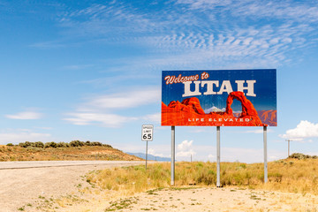 Utah state line sign off the highway