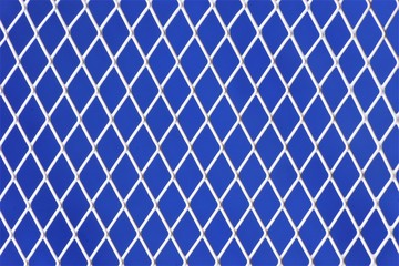 Metal mesh on a blue abstract background, good for design and creativity of the holiday. Many geometric shapes form a unique pattern, applicable to design and creativity, the art of abstraction.