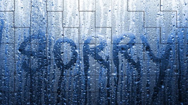 Conceptual handwritten sorry word on wet window with water drops. 3d square effect used.