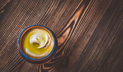 Bowl of hummus on  a table