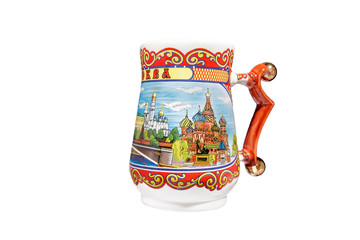 ceramic souvenir toy in the form of mug with beautiful color painting on isolated white background reflecting the national Russian culture with the inscription in Russian: city name Moscow