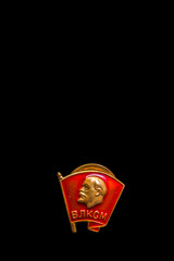 old soviet badge on a black background, isolate