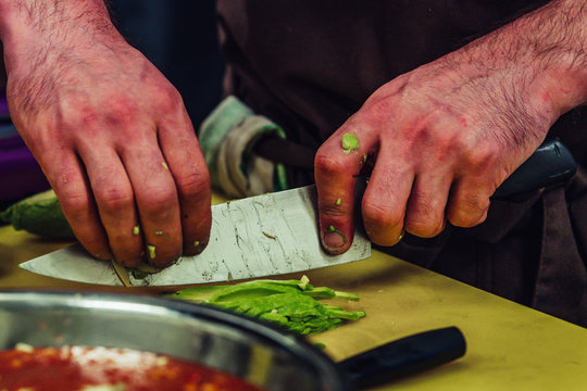 Male Chef Slicing Avocado for Wedding Meal - Kitchen Set with Isolated Action, Only Chef`s Hands