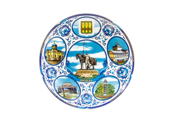 ceramic souvenir toy in the form of plate with color painting on isolated white background reflecting the national Russian culture with the inscription in Russian: the name of the city of Penza