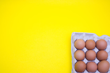 Egg, Eggs on a yellow background. Egg tray
