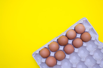 Egg, Eggs on a yellow background. Egg tray