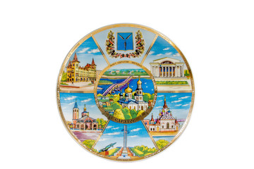 ceramic souvenir toy in the form of plate with color painting on isolated white background reflecting the national Russian culture with the inscription in Russian: the name of the city of Saratov