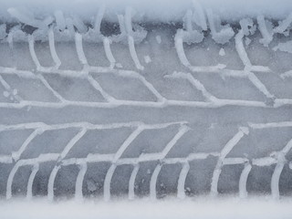 Car tyre print on the snow