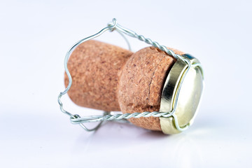 Champagne cork and metal basket on the table. Special closure from sparkling wine.