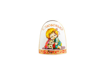 ceramic souvenir toy in the form of bell with beautiful color painting on isolated white background reflecting the national Russian culture with the inscription in Russian: With love