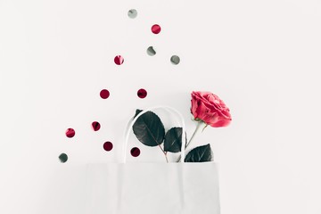 Flowers composition. Pink rose flowers on white background. Valentine's Day, Easter, Birthday, Happy Women's Day, Mother's day, holiday concept. Flat lay, top view, copy space