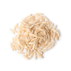 Uncooked brown rice on white background, top view