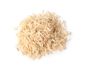 Uncooked brown rice on white background, top view