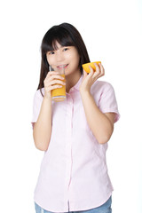 Chinese woman drinking orange juice isolated on white background