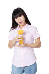 Chinese woman drinking orange juice isolated on white background