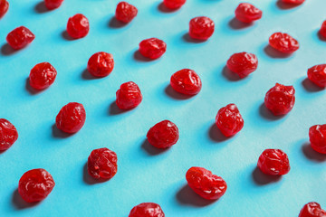 Fototapeta premium Cherries on color background. Dried fruit as healthy snack