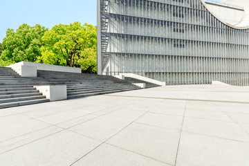 Empty square floor and modern commercial building in Shanghai