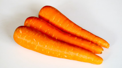 Fresh carrot isolated on white background.