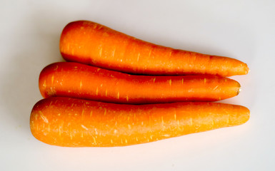 Fresh carrot isolated on white background.