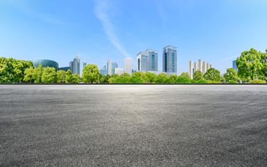 Panoramic city skyline and buildings with empty asphalt road in Shanghai