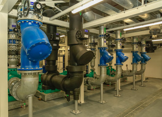Typical installation for pump and piping in chiller plant with valve tag and show how to install...