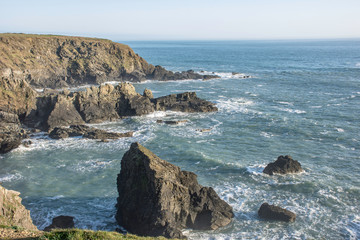 Fototapeta na wymiar Rugged rocky coastline in Pembrokeshire in South Wales.