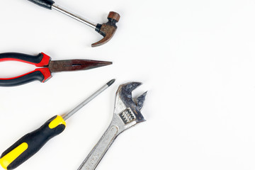 Rustic old used tools hammer wrench screwdriver nose plyers