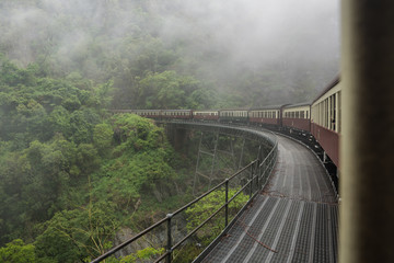 Kuranda train going over a bridge in the rainforest near Cairns, Australia