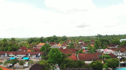 Flying with drone over balinese traditional temple. 4K aerial view footage, no edit.