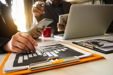 New startup project. Business team meeting present.professional investor working with  Finance managers task. with smart phone and laptop and digital tablet computer in morning light