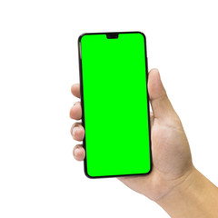 Man holding a black mobile phone with green screen isolated on a white background.
