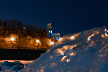 View of the city of Khabarovsk from the Amur river. Frozen river.