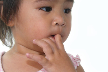 Little Asian Girl finger sucking.