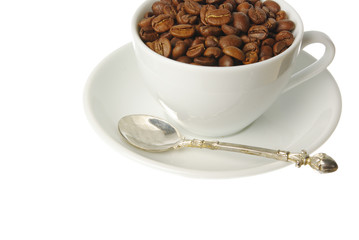White cup with coffee beans on a white background. Isolated on white