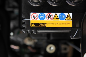 general warning sign to protect accident when some one work near the battery