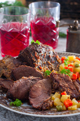 Baked beef with vegetables, selective focus