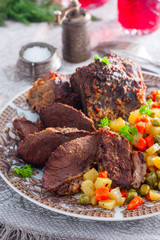Baked beef with vegetables, selective focus