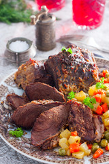 Baked beef with vegetables, selective focus