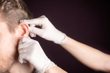 close up photo of person have ear hearing problems isolated  b
